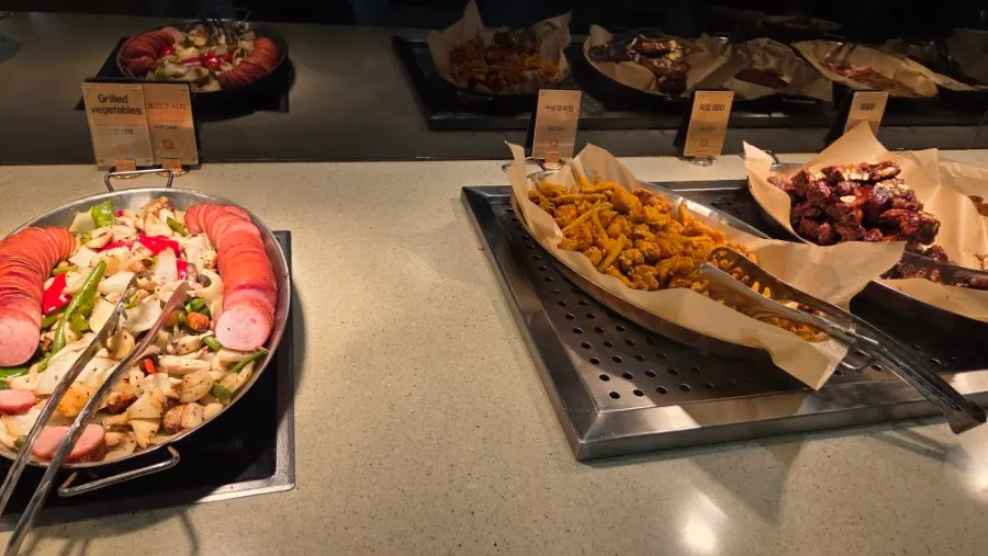 Hot dish corner with pizza, pasta, and fried items