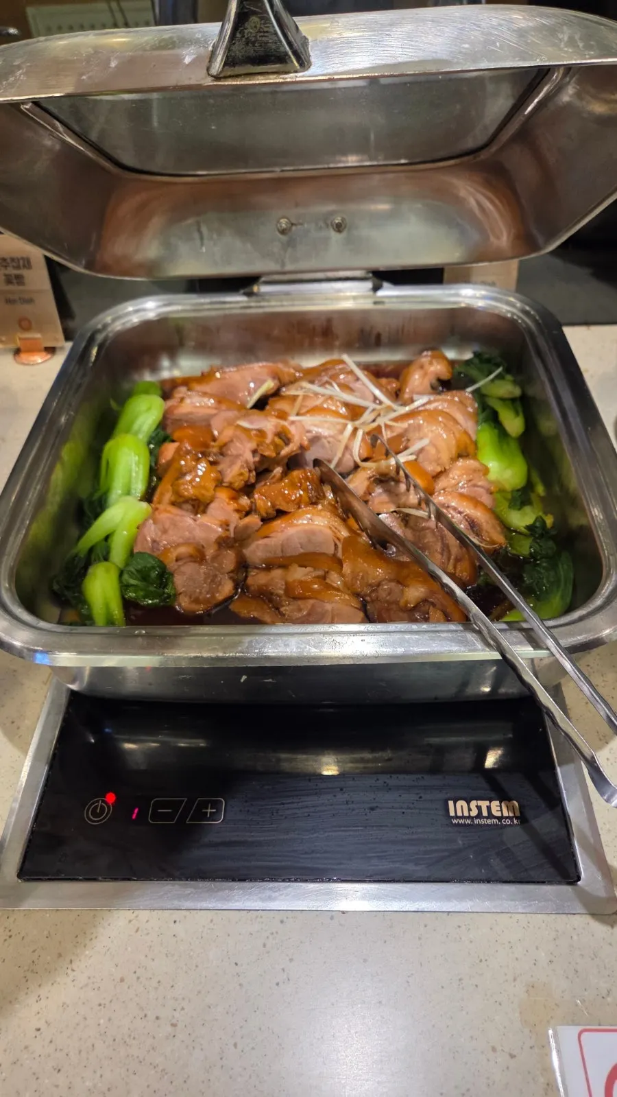 A plate of grilled meat from the grill corner