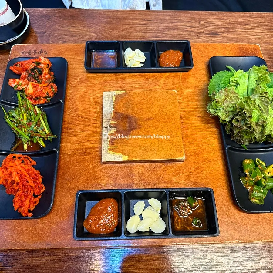 Neatly presented side dishes and sauces