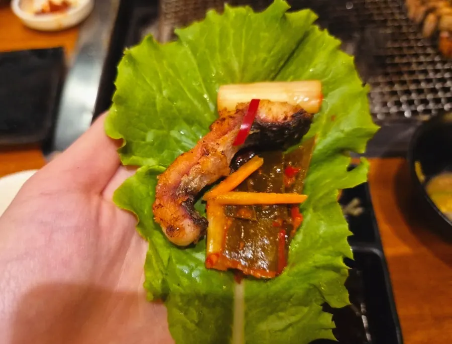 Wrap vegetables topped with a plump piece of eel