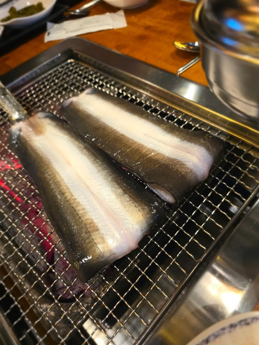 Sign explaining what's included in the eel sets