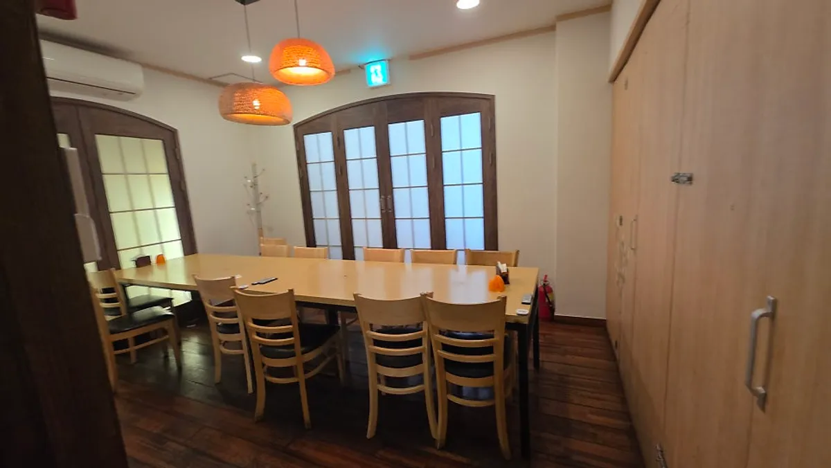 Interior of Masil's window seats with sunlight through floor-to-ceiling glass