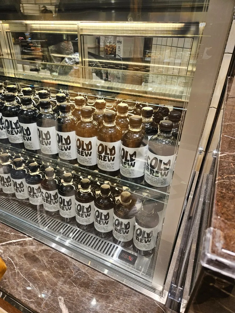 In front of the order counter at Jeong Ji-young Coffee Roasters, Nowon