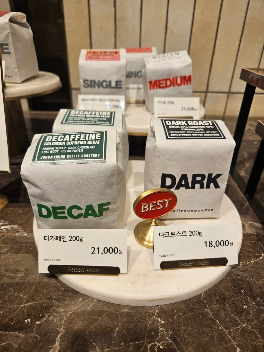 Bags of specialty coffee beans on display in-store