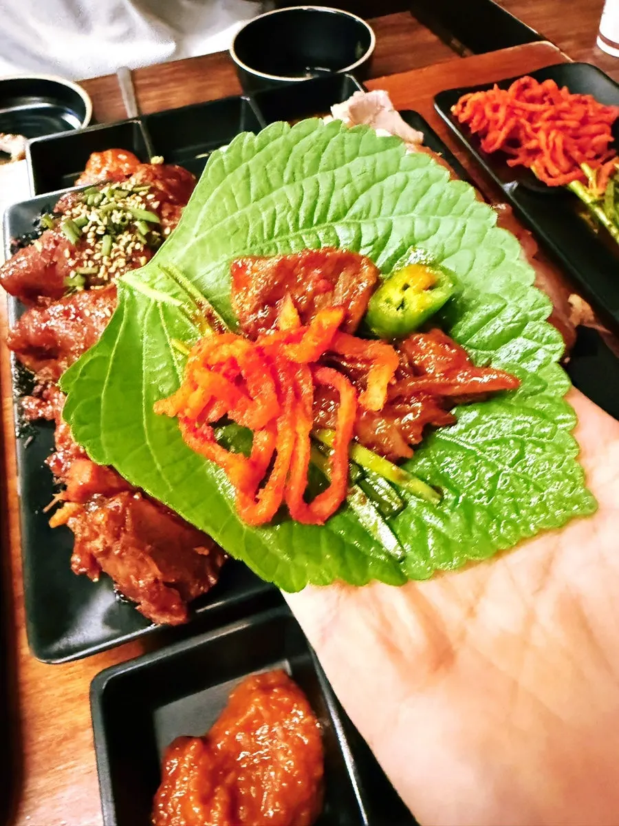 Half-eaten plate of half-and-half jokbal