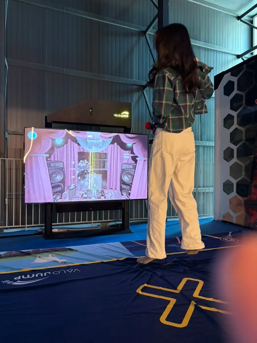 Playing the Foot Jump air mat game at Jump