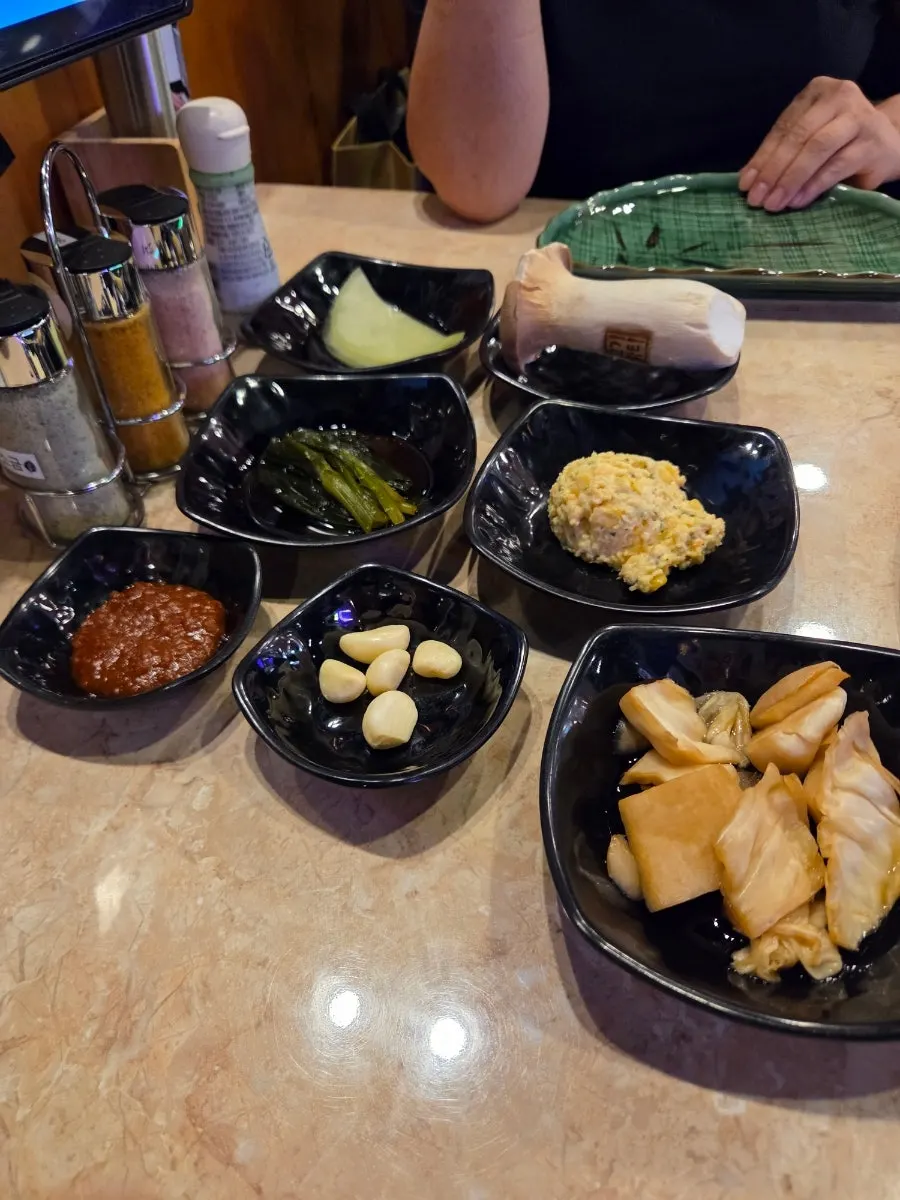 Plate of ssamjang, fresh wasabi, and wholegrain mustard sauces