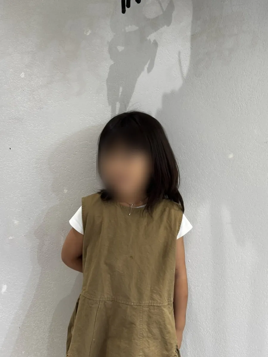 The 7-year-old's hair falling straight after the perm