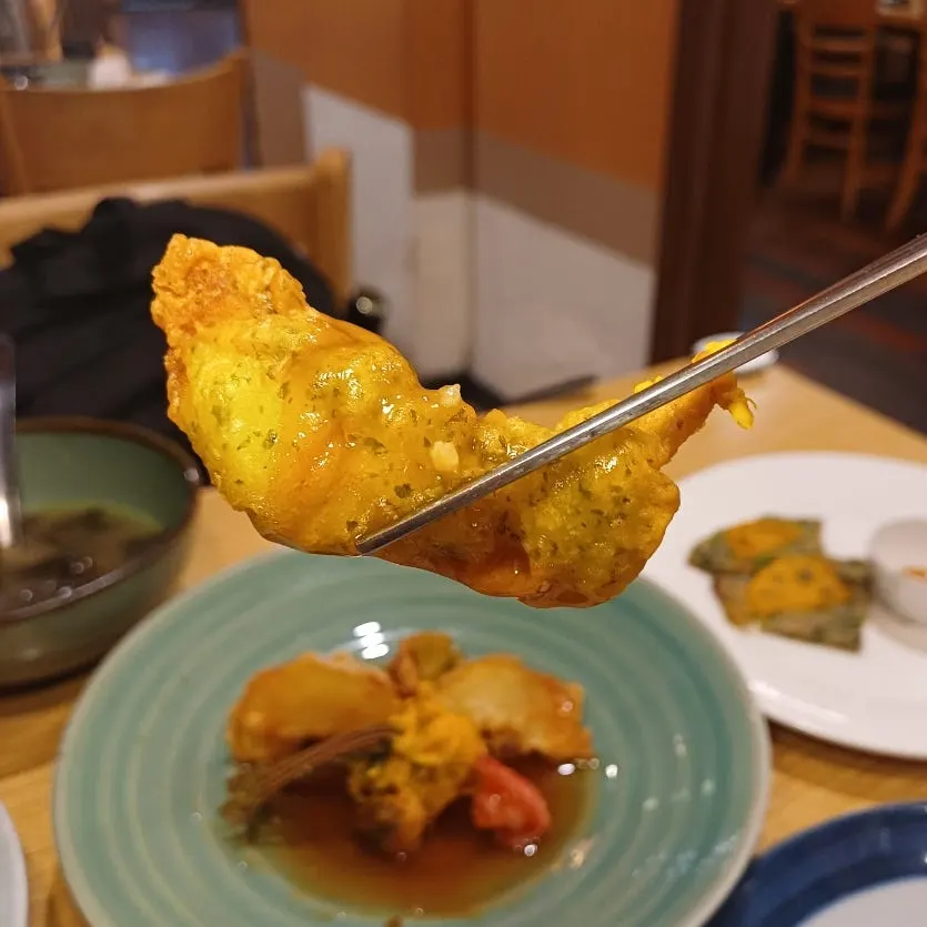 Flounder tangsu served with a sweet pumpkin salad