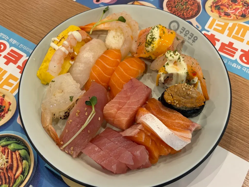 Plates of sushi and dishes brought back to share with family