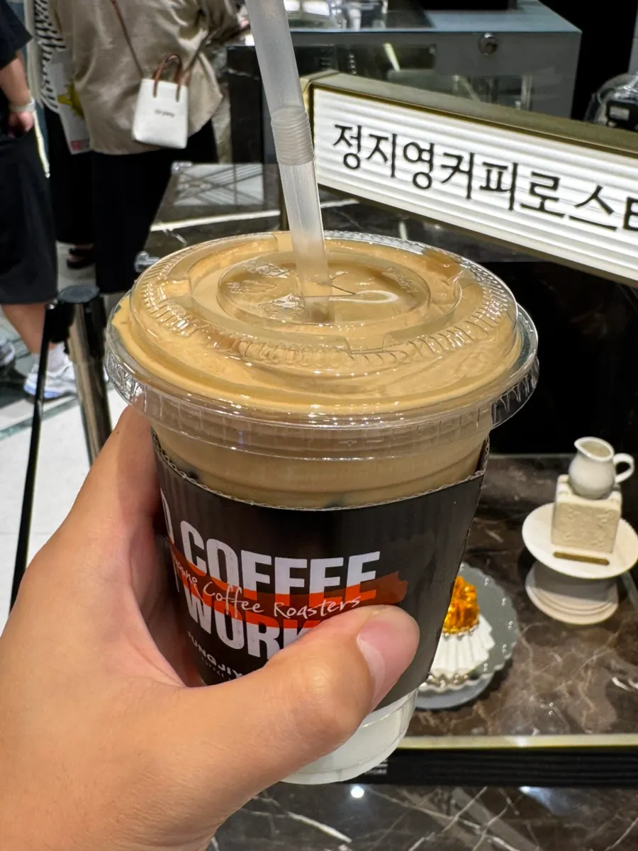 Signature coconut latte topped with creamy foam