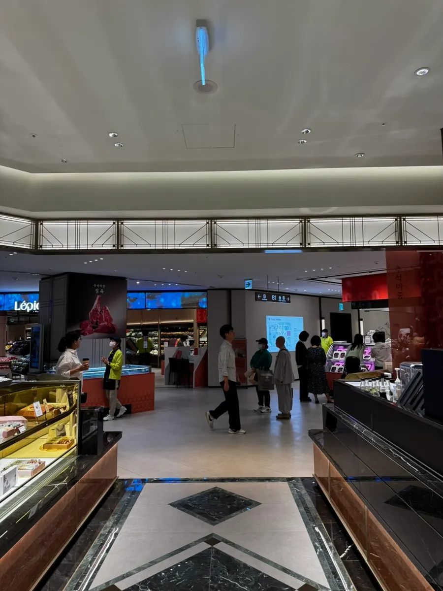A signature latte enjoyed at a Nowon Lotte Department Store café