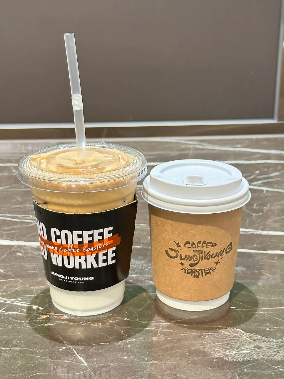 Signature coconut coffee with layered coconut milk and whipped espresso