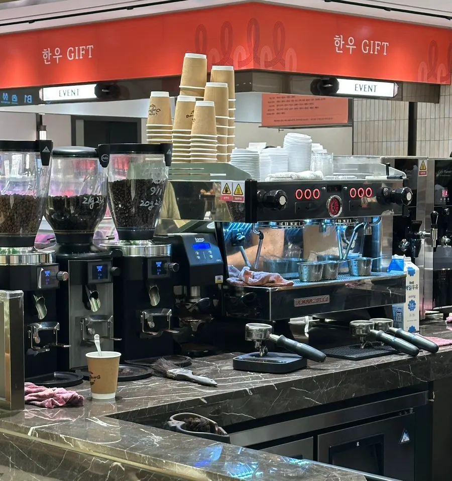 Branded merchandise including flat pencils from Jeong Ji-young Coffee Roasters