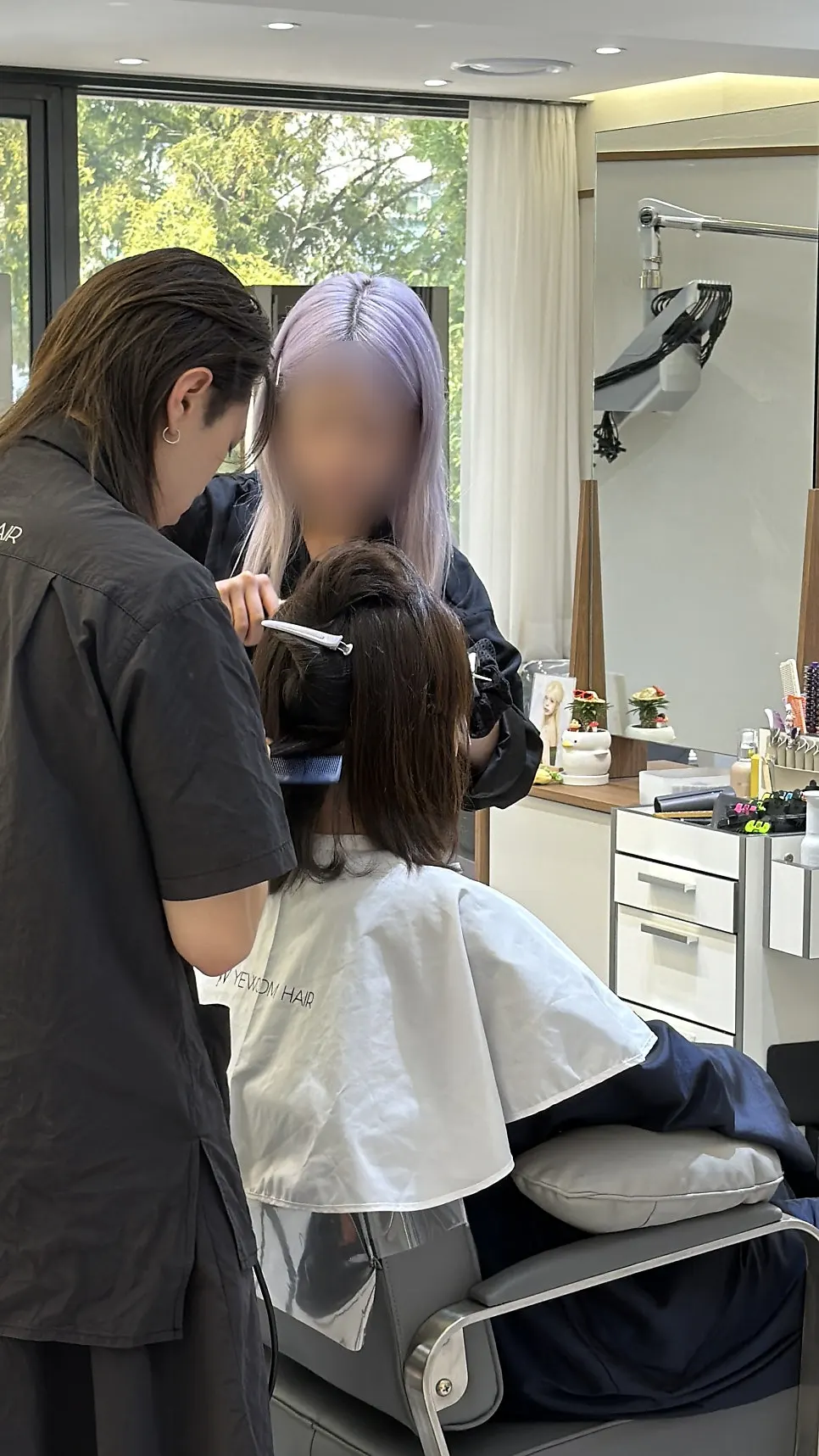 レイヤードカットの動きを生かした中ボブ