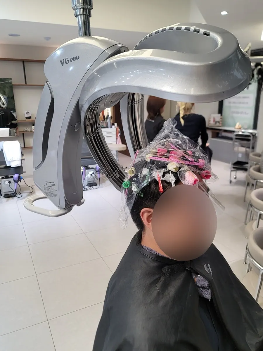 Preparing for the down perm after the cut