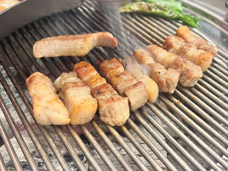 Iberico pork jowl and pork belly on the grill