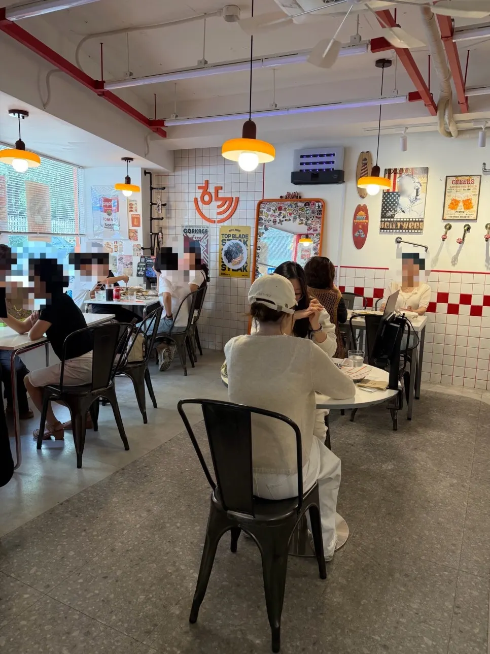 Tables for 2–4 people inside the restaurant
