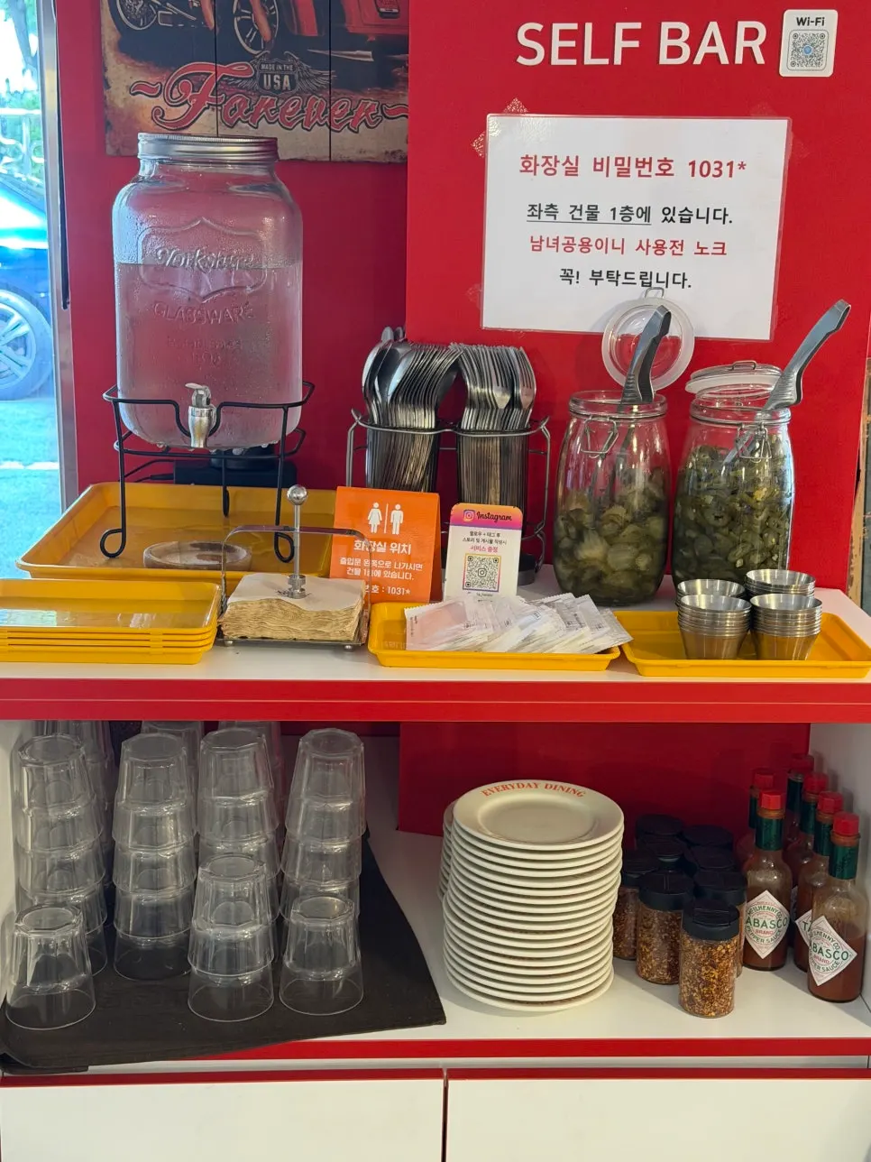 Self bar with cutlery, pickles and sauces