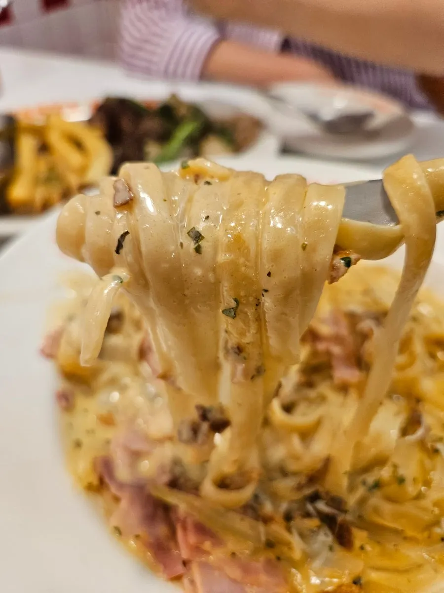 Pasta noodles coated in rich Tuumba sauce