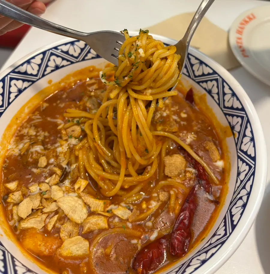 Pasta with tomato sauce and seafood