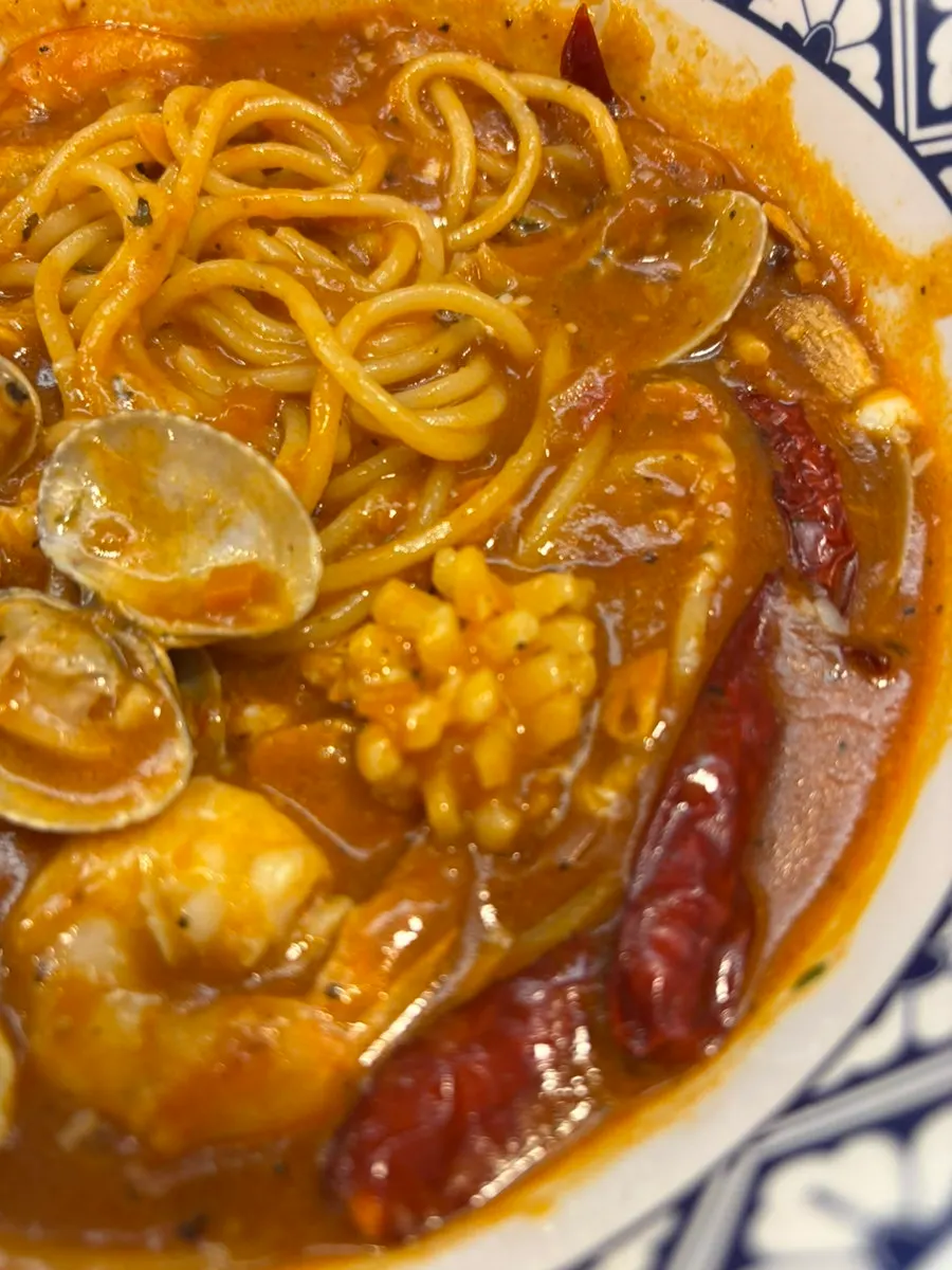 Brothy red tomato pasta