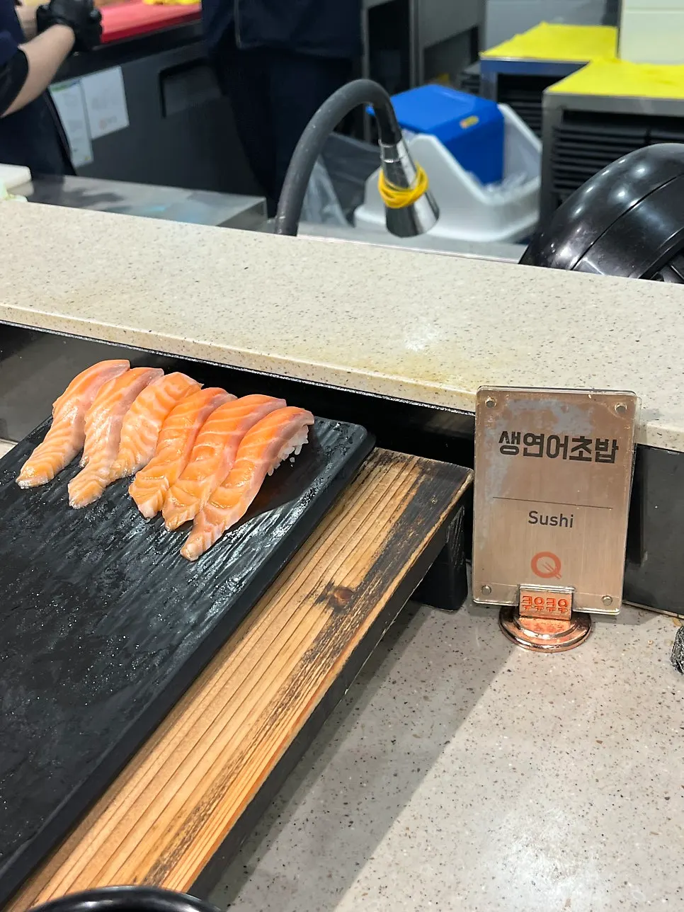 Salmon sushi topped with Norwegian raw salmon
