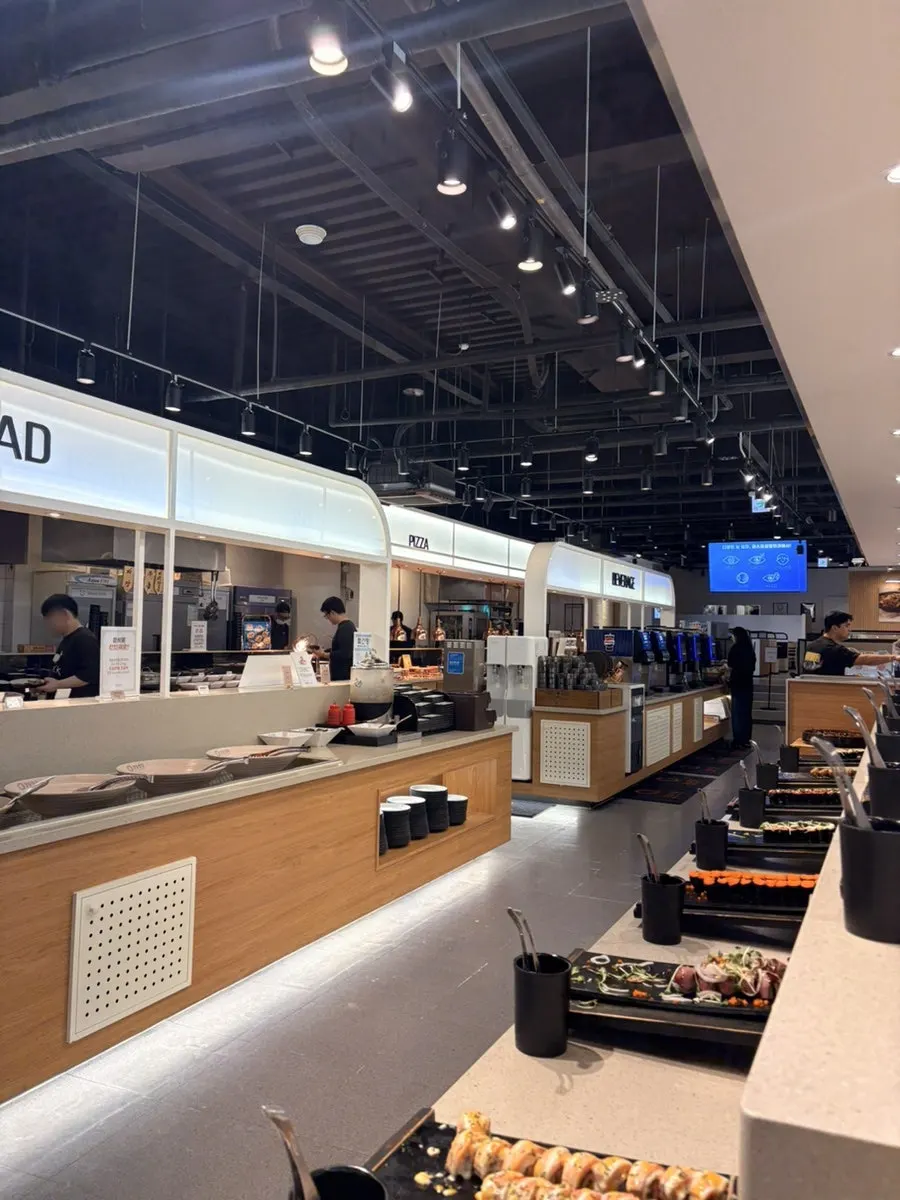 Sushi piled high on the display counter