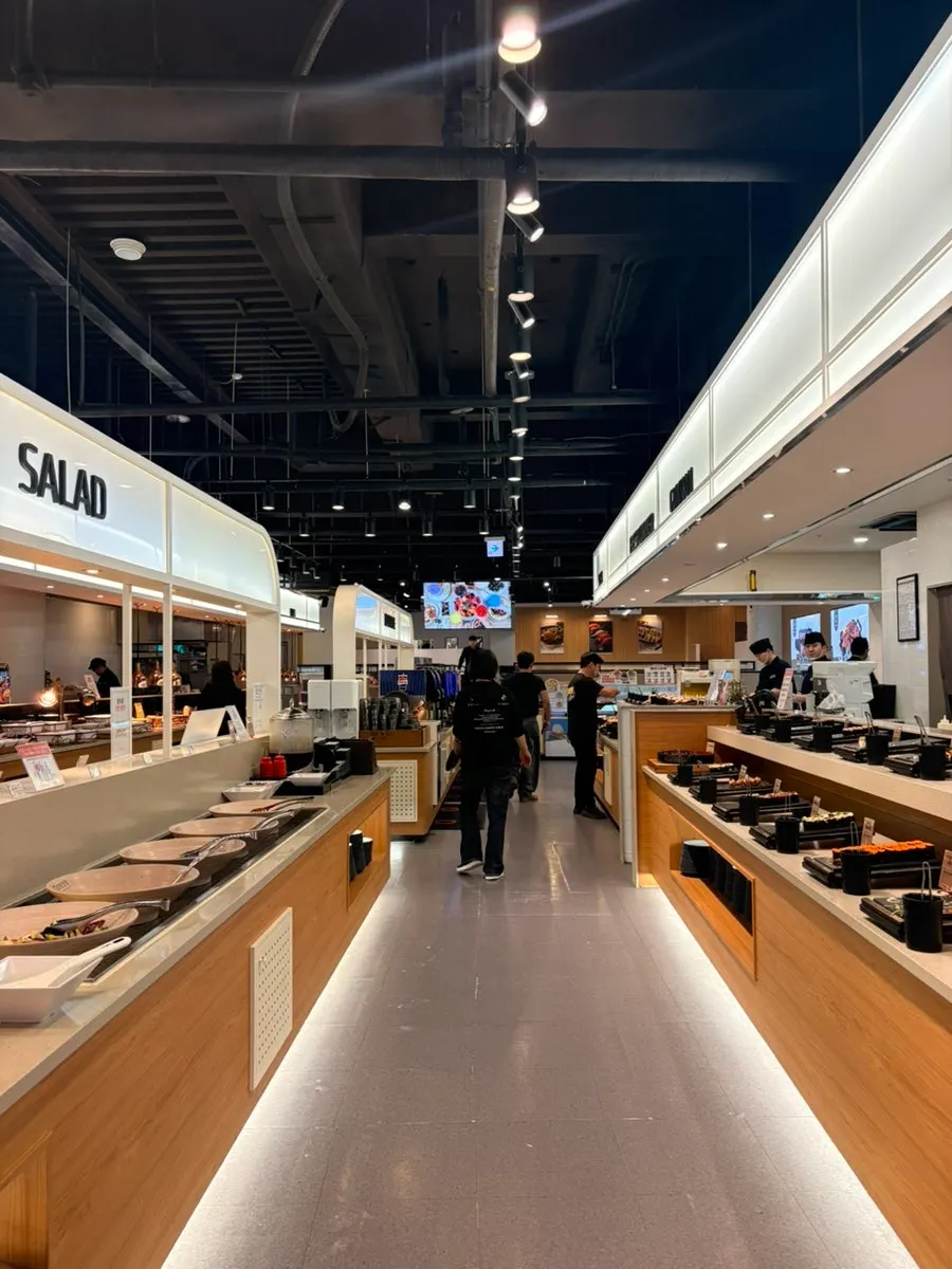 Buffet counter with roll sushi and sushi