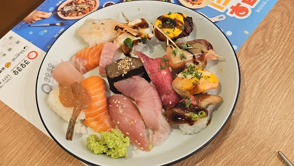 The first plate filled with chosen dishes