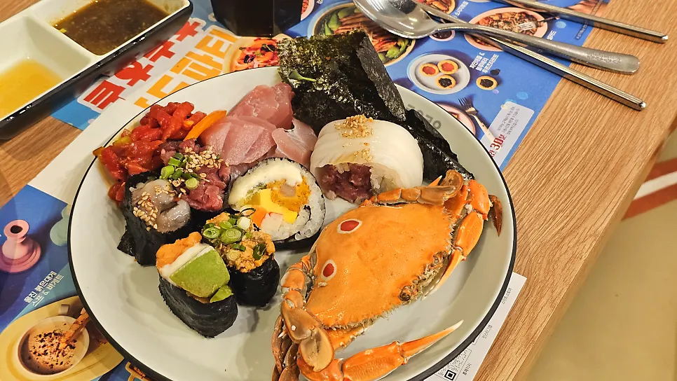 A plate of hot food and barbecue