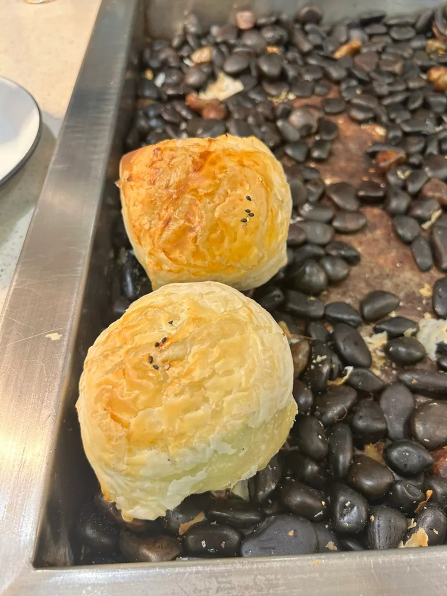 Ang-croute pastry soup served on a maekbansuk stone slab