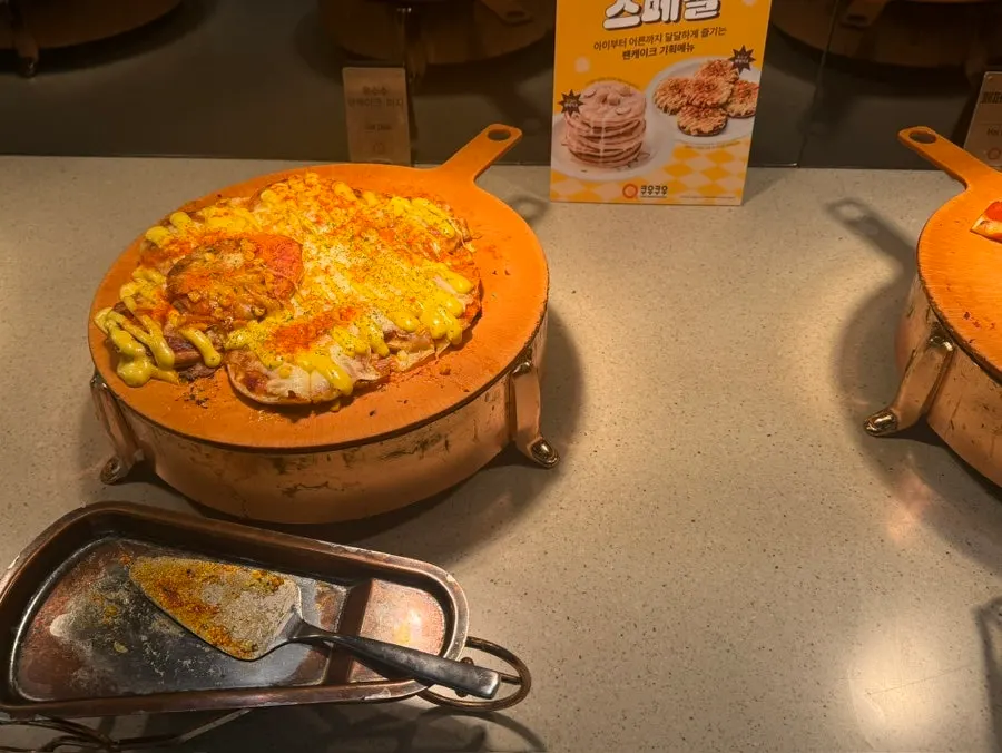 A plate of fried food and Korean snacks