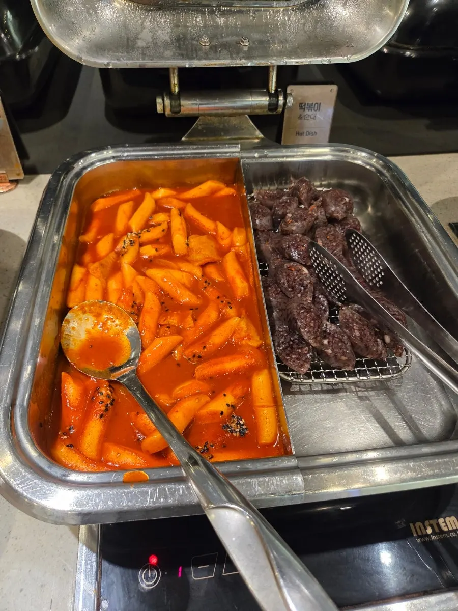 Meat dishes including chicken drumettes and fried items