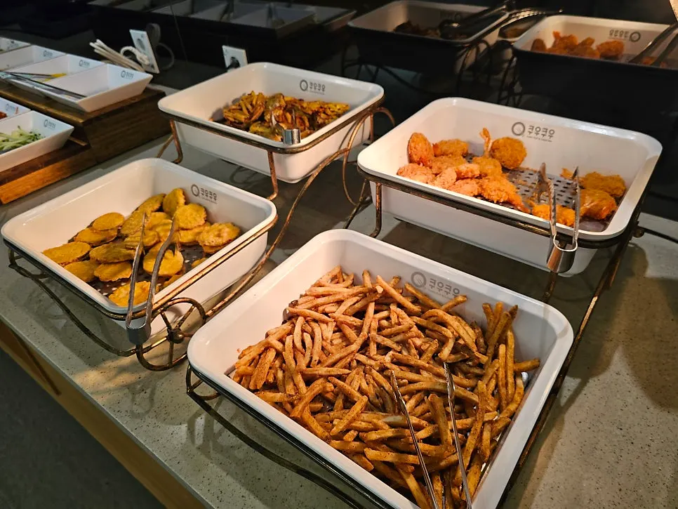 Fried food items in a buffet warmer