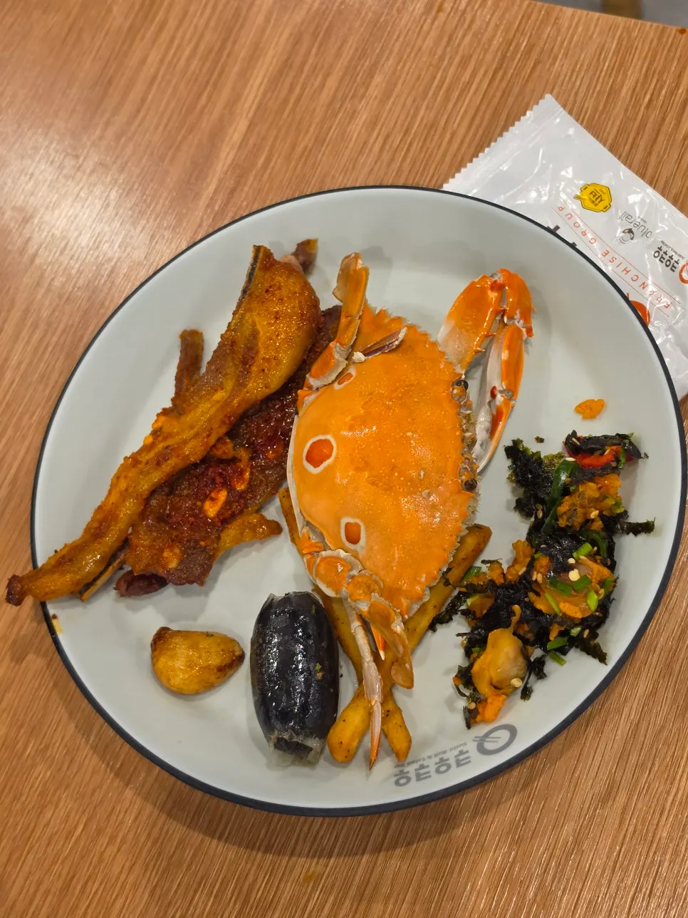 A plate of lamb chops and cockle bibimbap