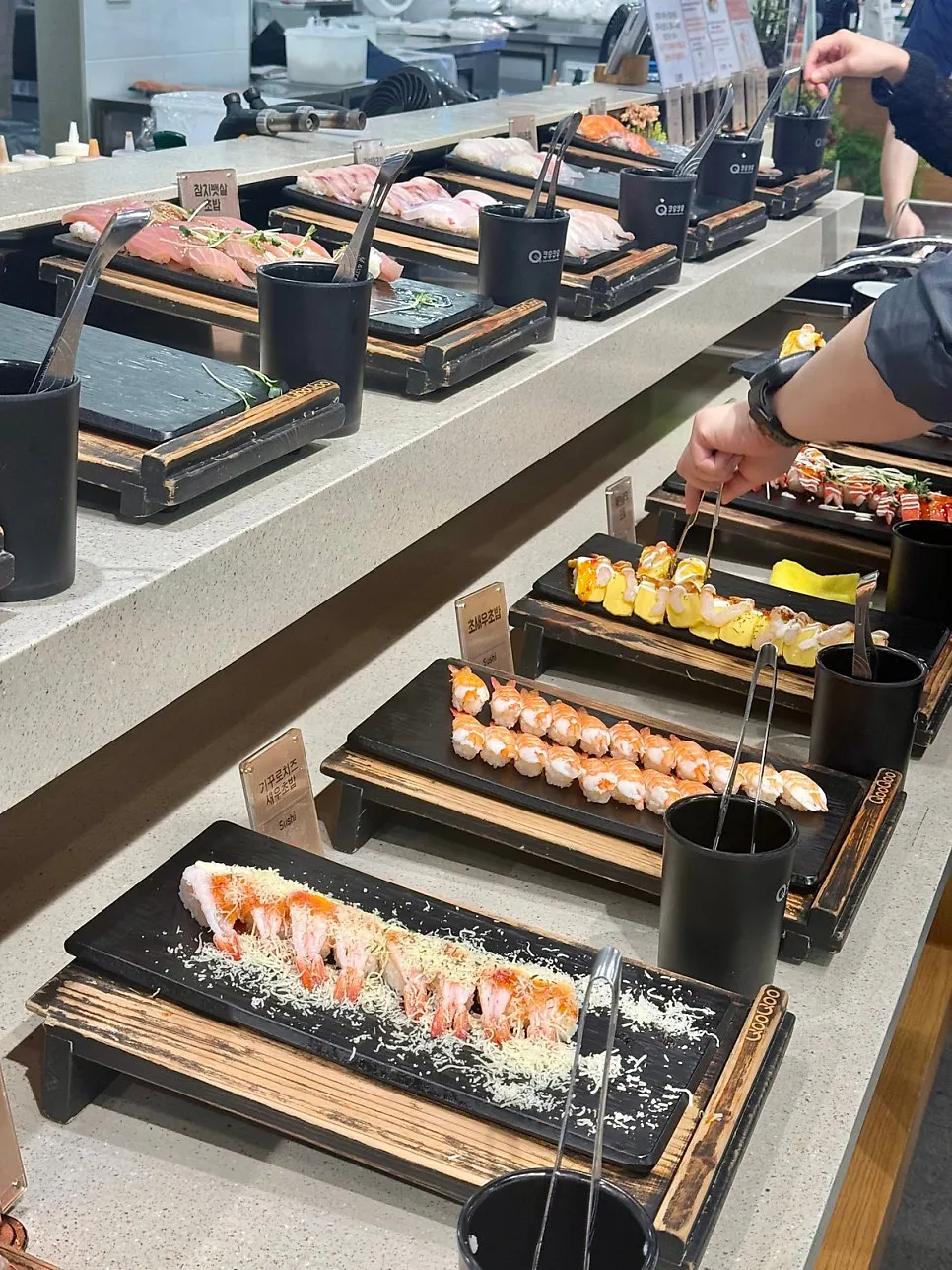 Food station viewed while carrying a plate