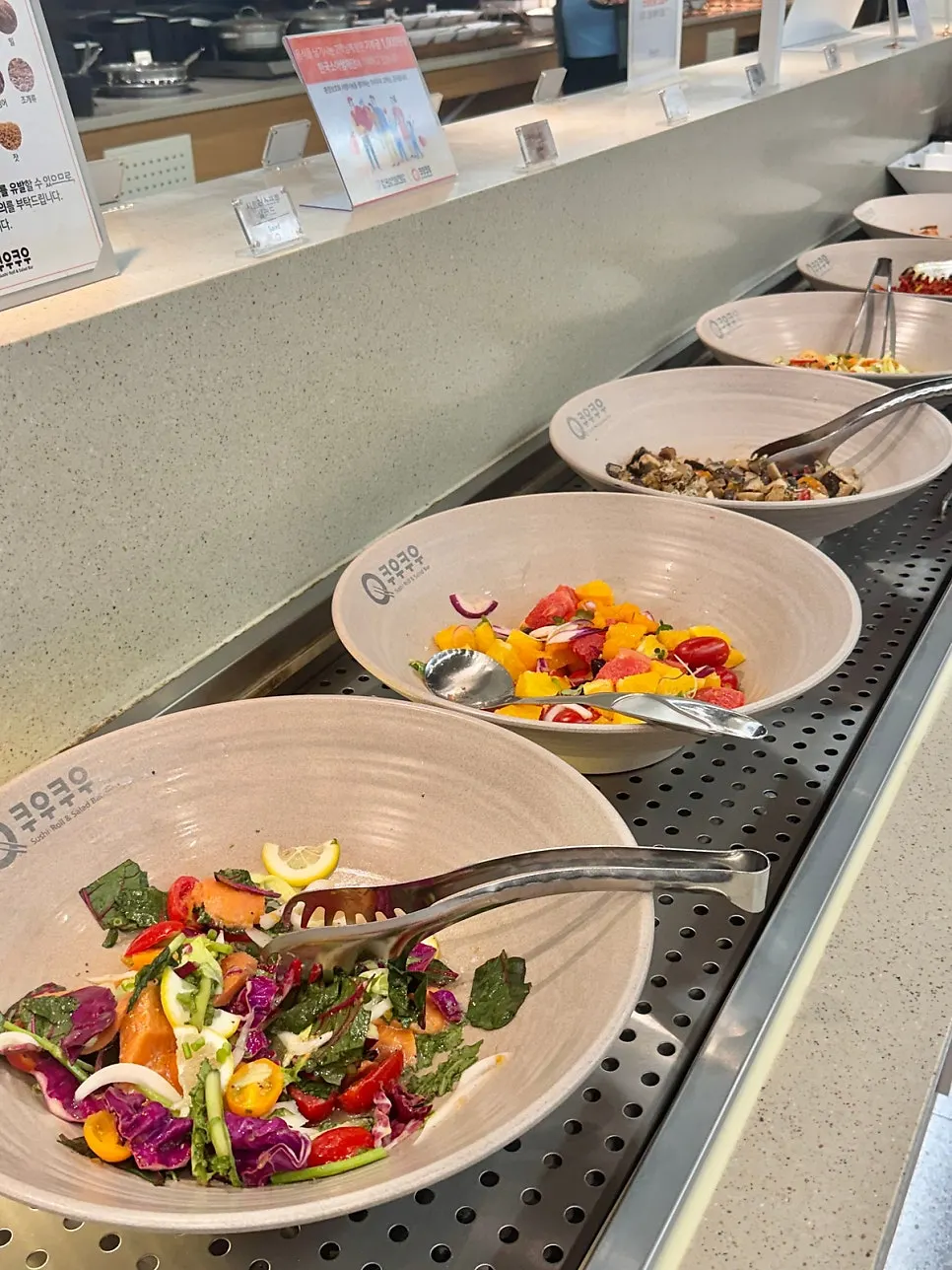 Chinese-style dishes including guobaorou and chili shrimp