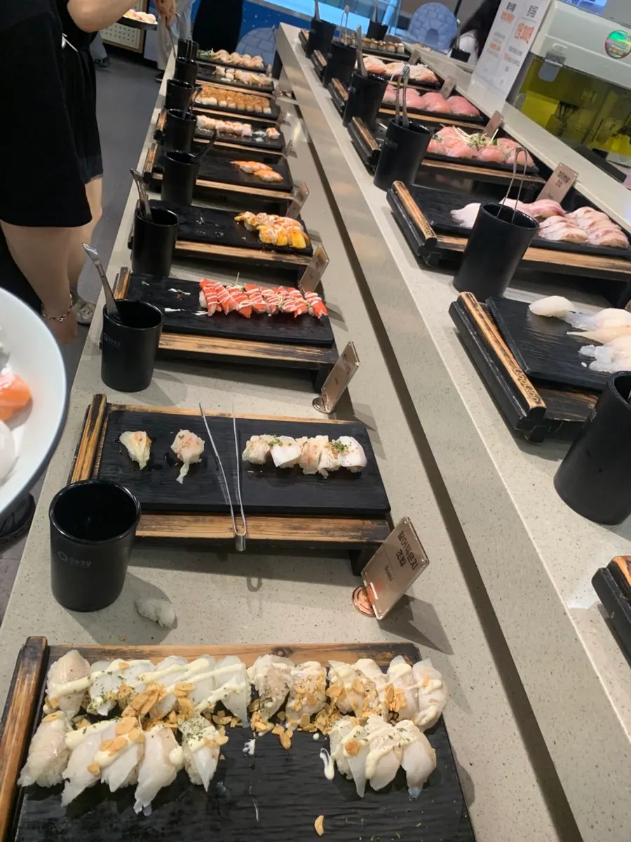 Plate of assorted sushi brought back to the table
