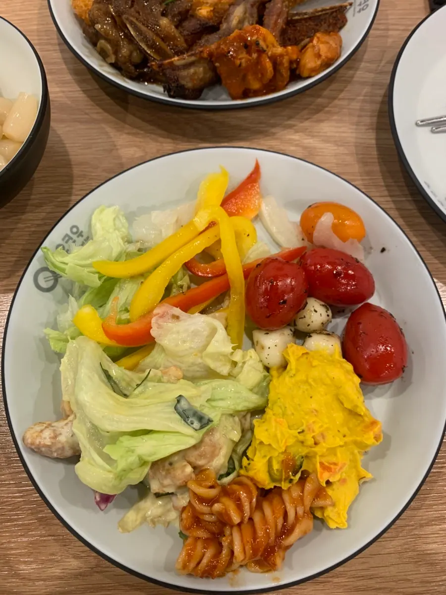 Plate of various buffet dishes