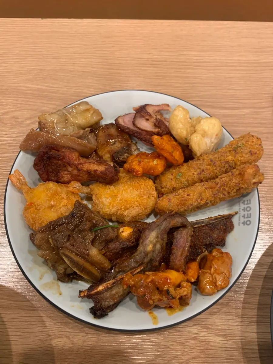 Table set with multiple plates of buffet food