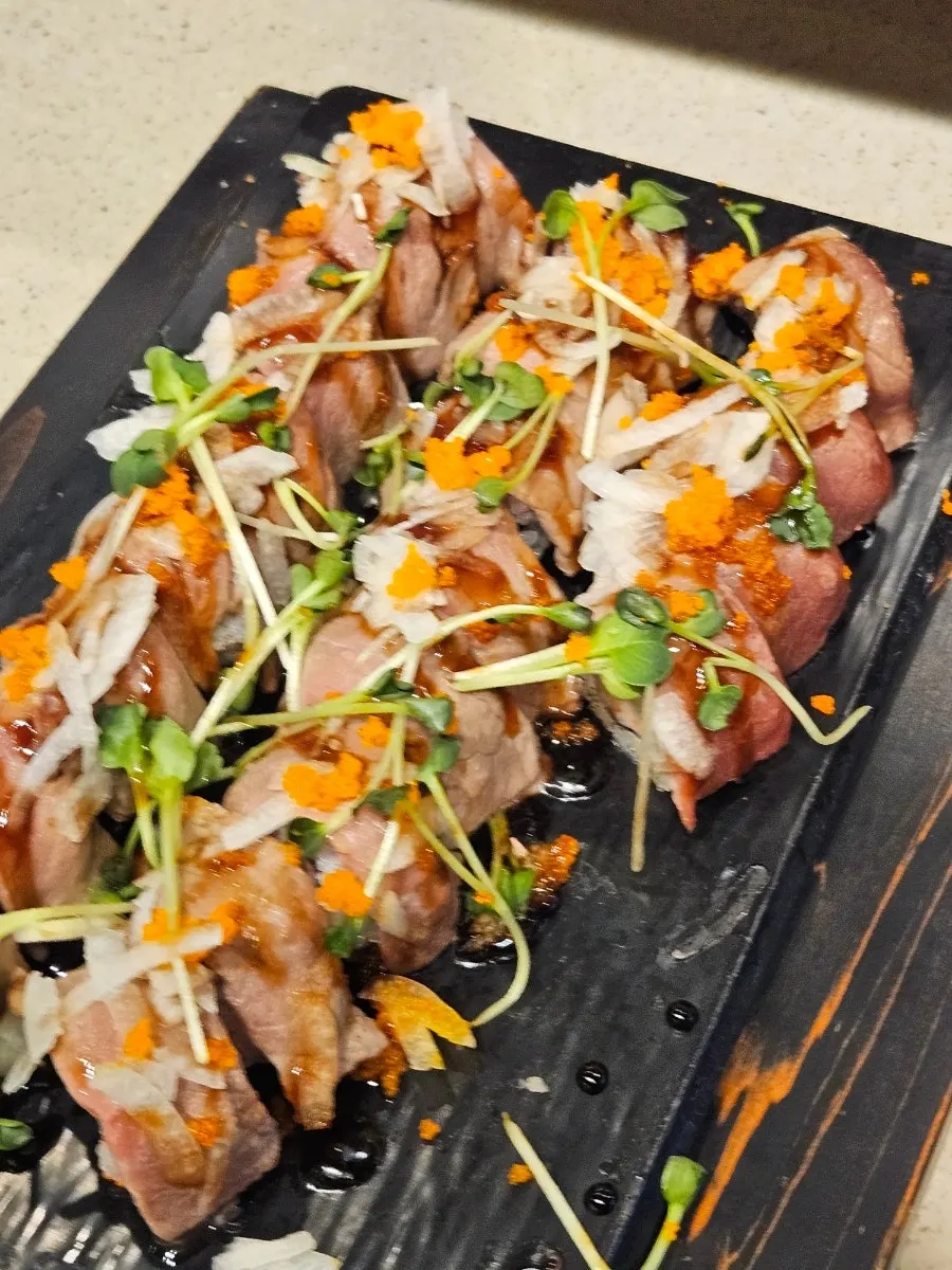 A close-up view of the sushi buffet display