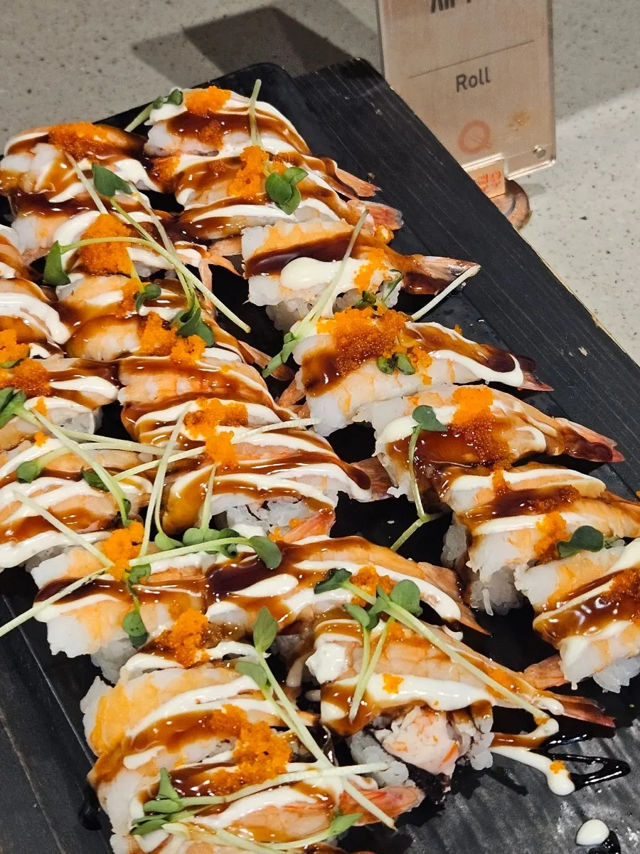 A plate of sushi and sashimi