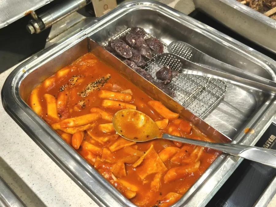 A plate of meat dishes brought back to the table