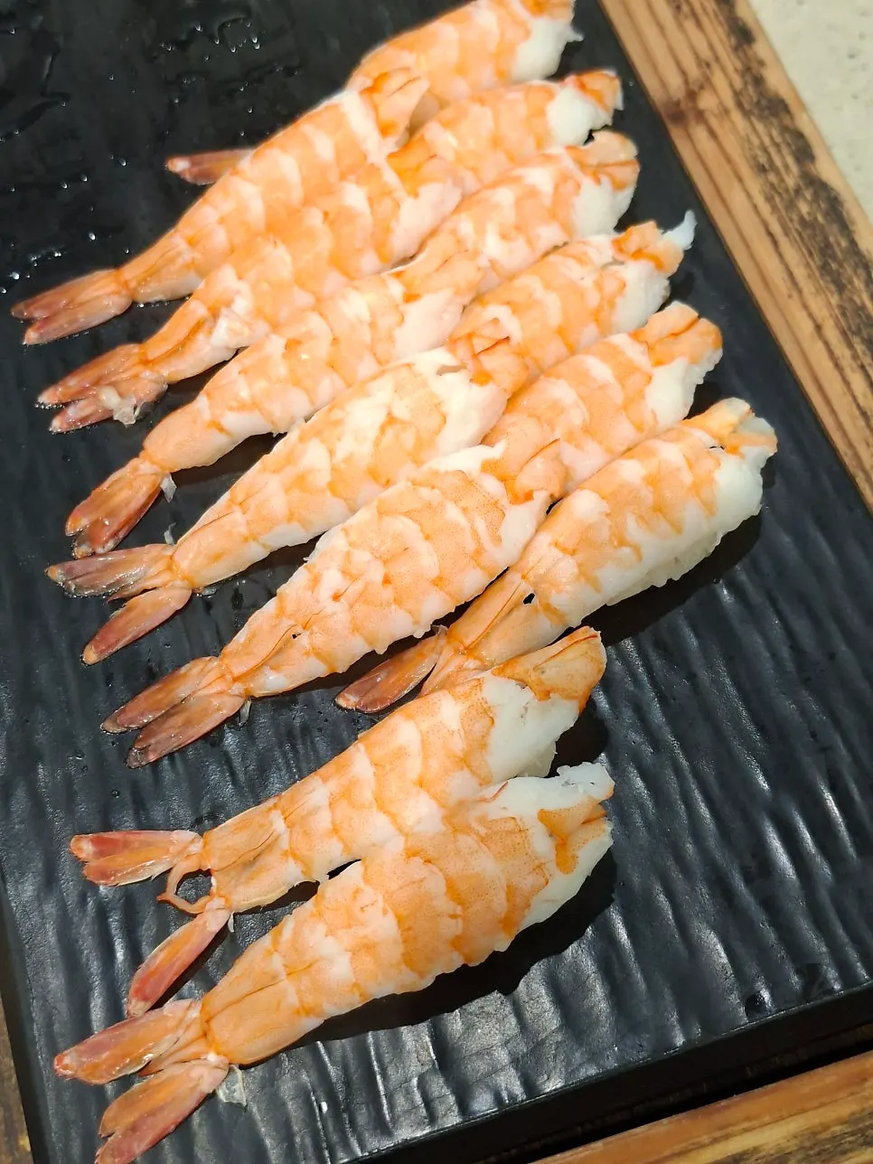 Botan shrimp sushi and items at the sushi station