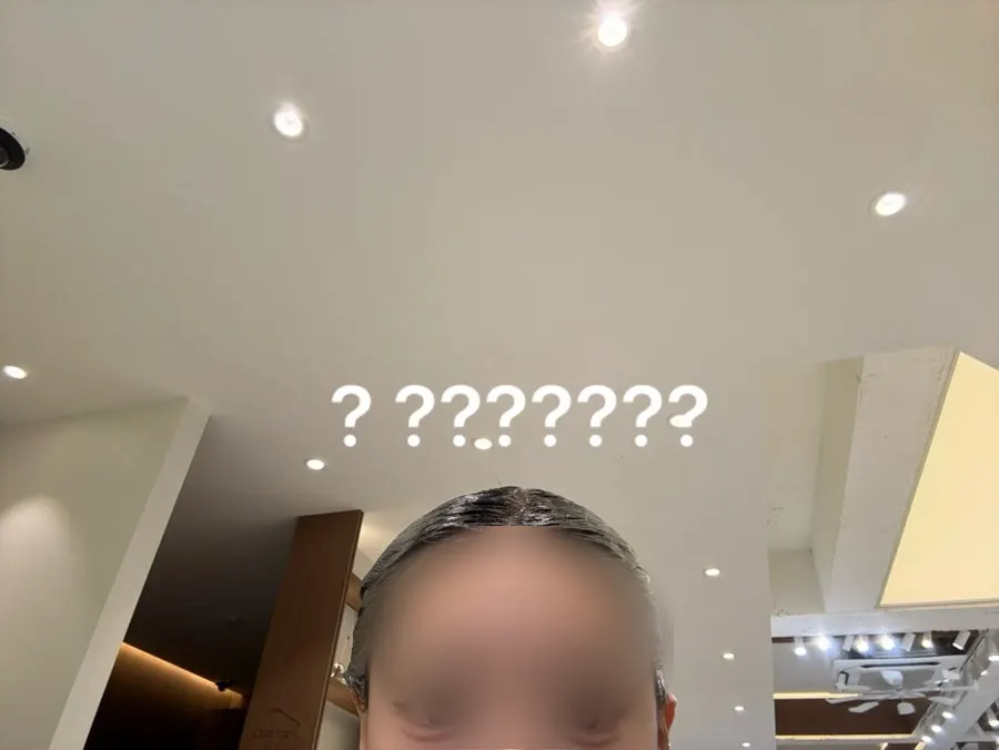 Hair wrapped up after dye application