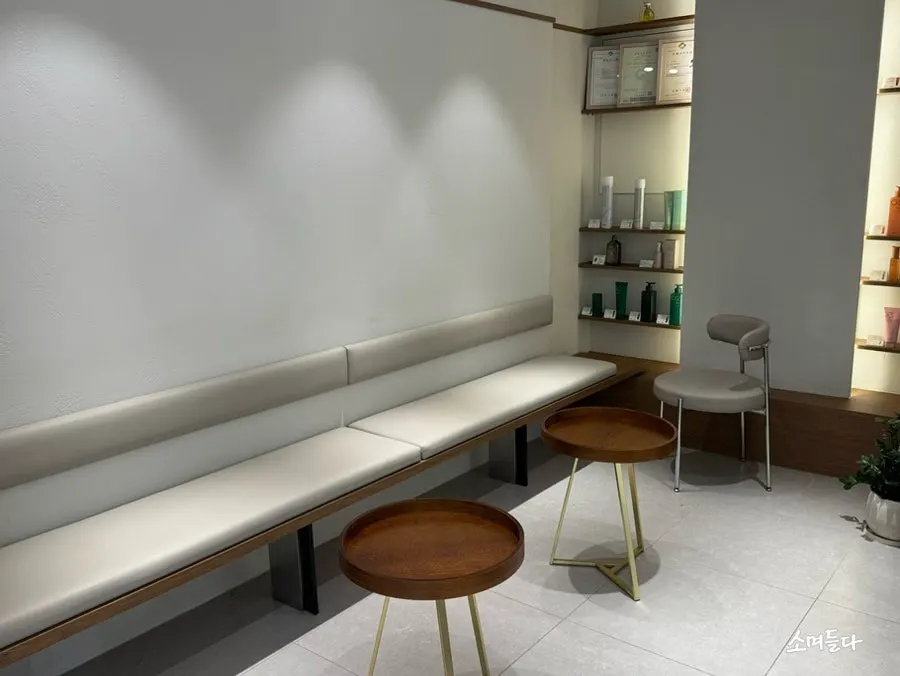 Spacious service seating area at Yeum Hair