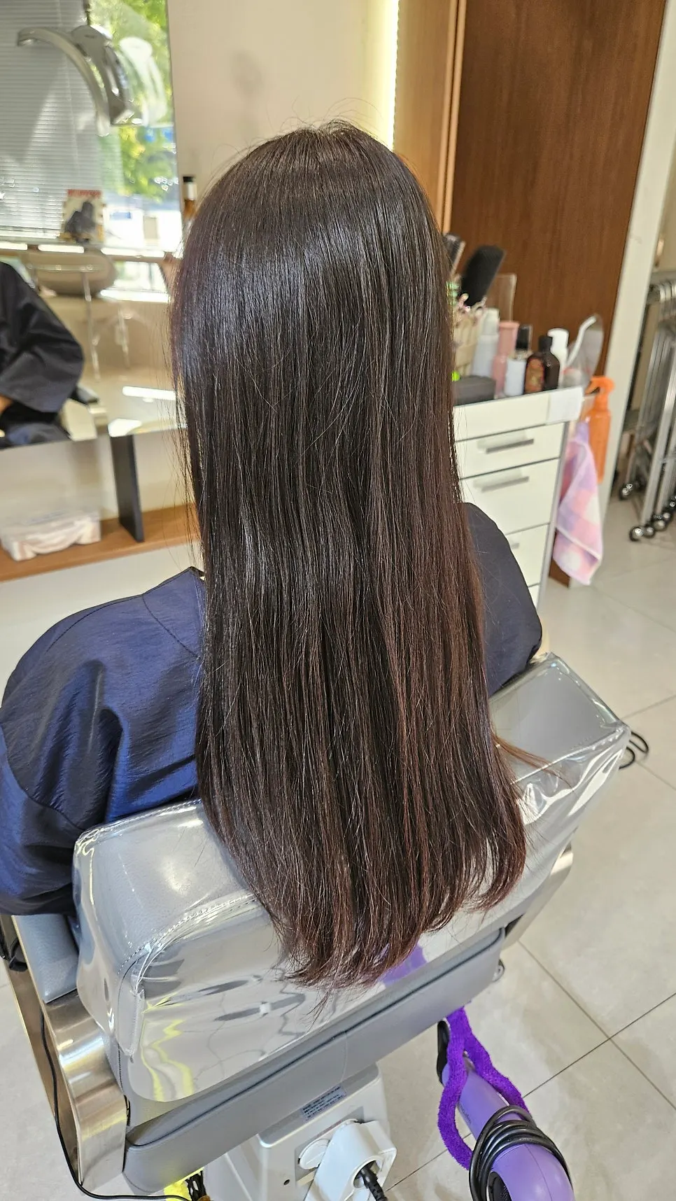 Long, straight hair before the service