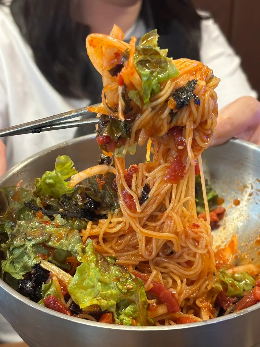 Beef tartare noodles mixed with the sweet and spicy sauce