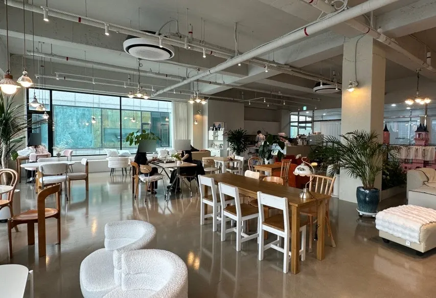 Tables and sofas inside Nyanya café
